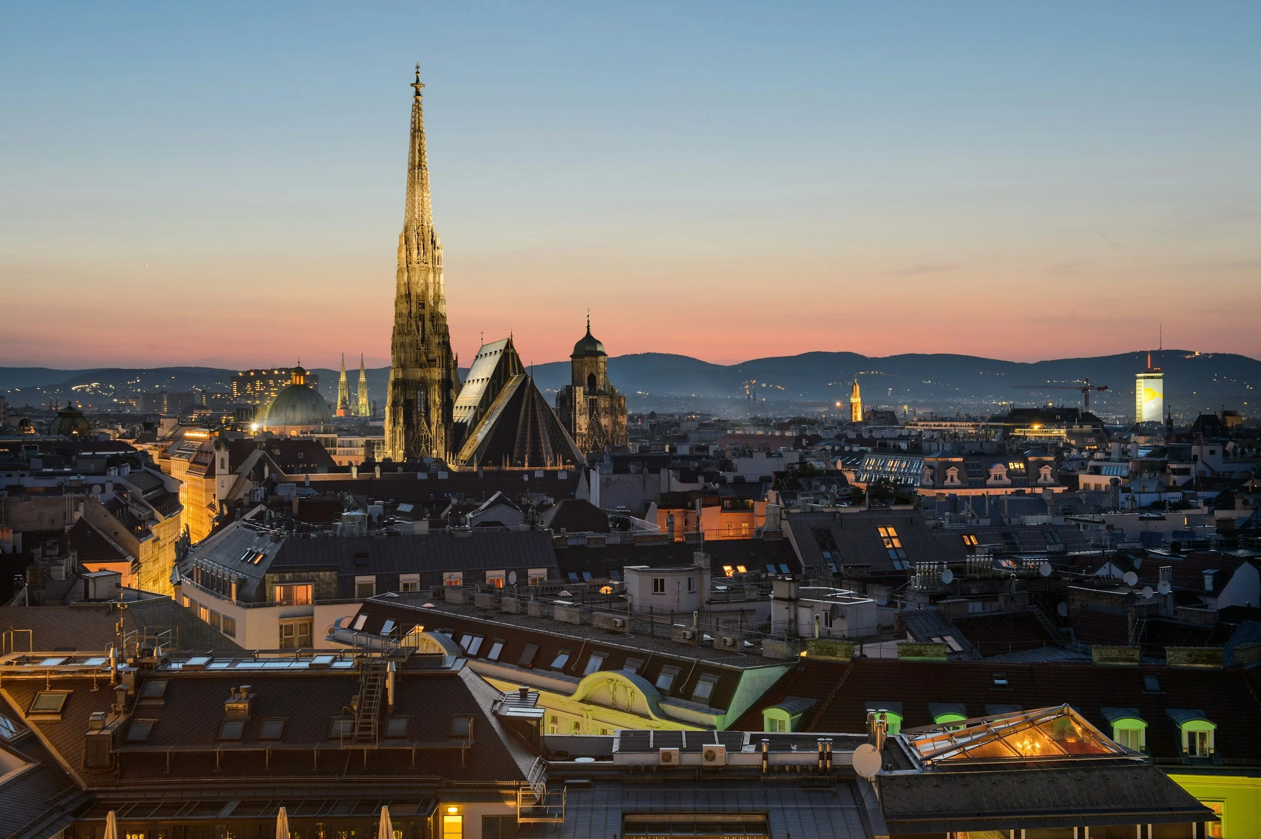 Vienna rooftops and St. Stephen's Cathedral at dusk